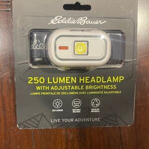 Brand new, never used Eddie Bauer green 250 Lumen Headlamp in original packaging